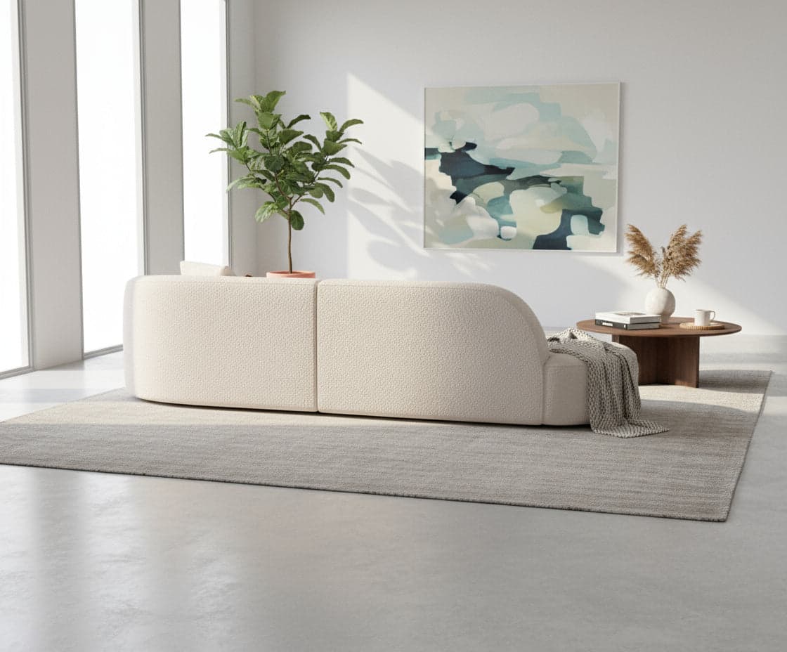 Elsa fabric sofa in white, back view in a living room